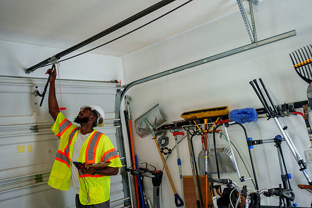 Professional Garage Door Panel Replacement technician working in Nassau County County, NY